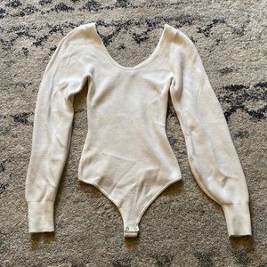 Cozy cream bodysuit.